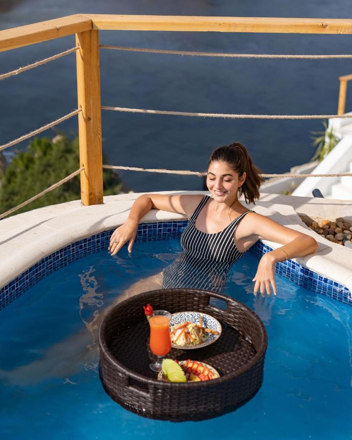 Benben By Dhara Hotels - Adults Only Aswan Exteriör bild A woman in a swimming pool