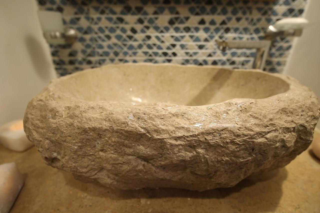 Benben By Dhara Hotels - Adults Only Aswan Exteriör bild A stone sink