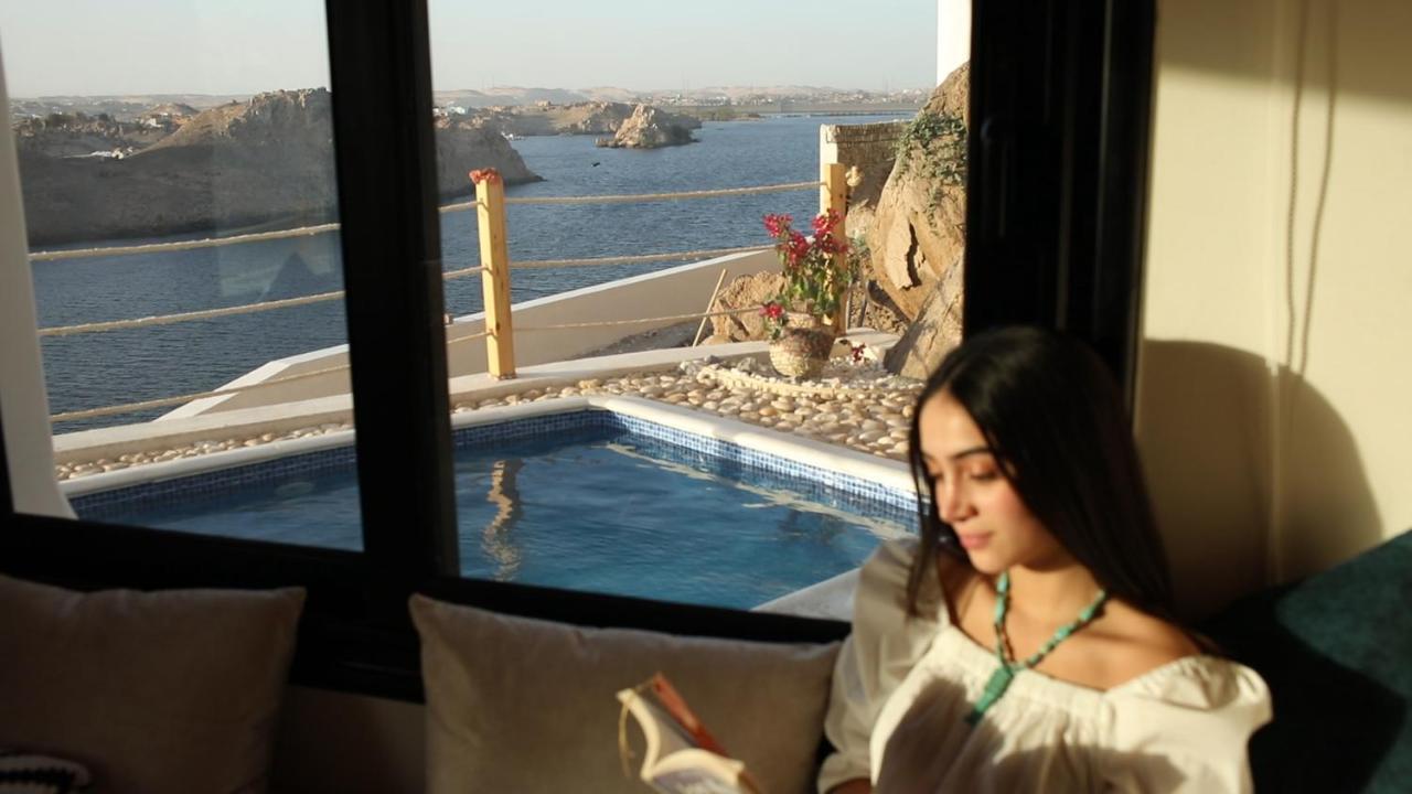 Benben By Dhara Hotels - Adults Only Aswan Exteriör bild A woman meditating