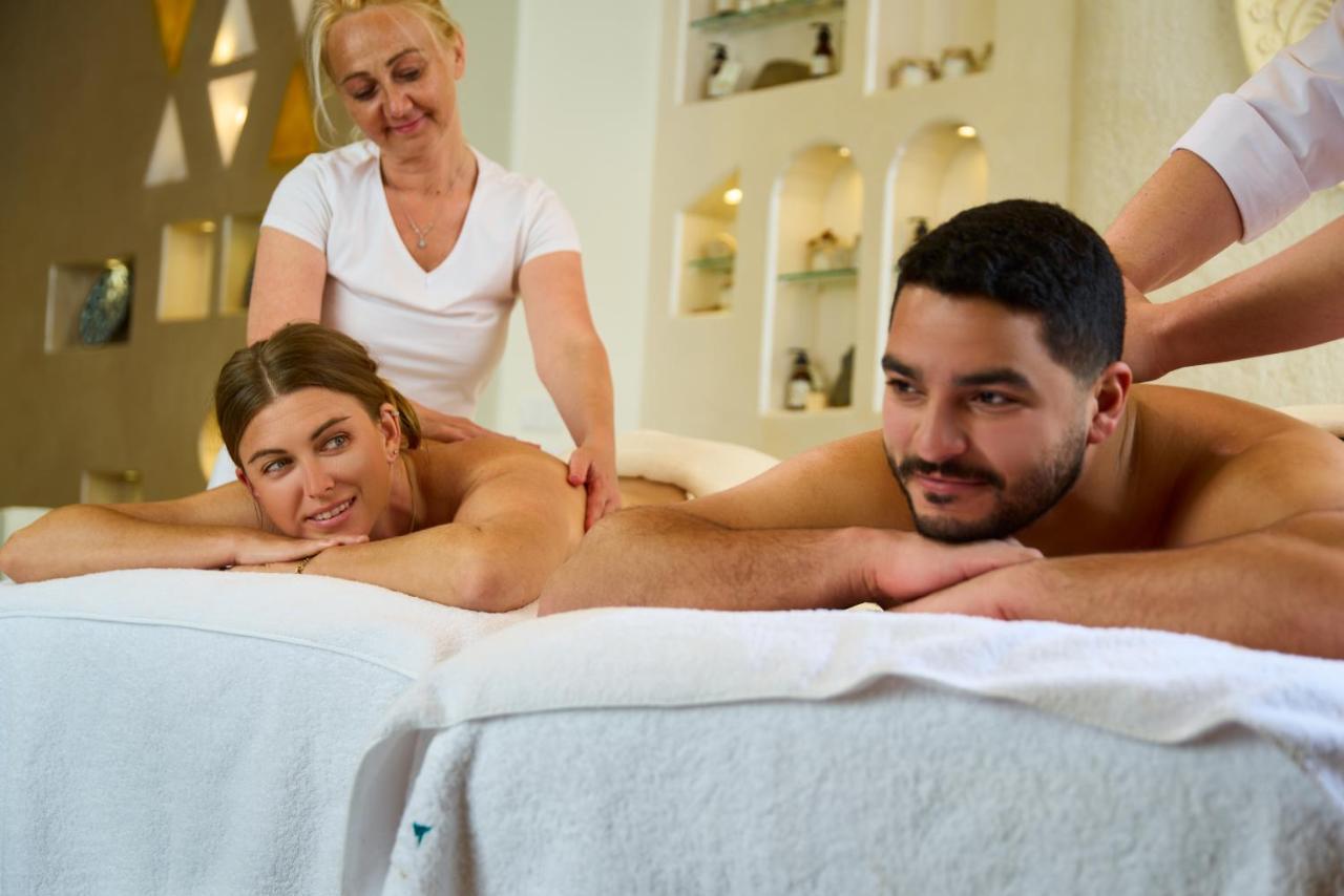 Benben By Dhara Hotels - Adults Only Aswan Exteriör bild Massage therapists working on a couple