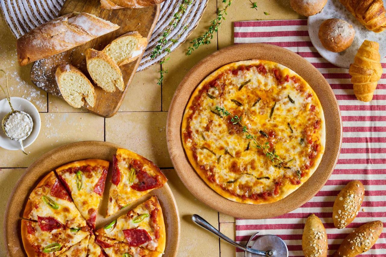 Benben By Dhara Hotels - Adults Only Aswan Exteriör bild Pizza
